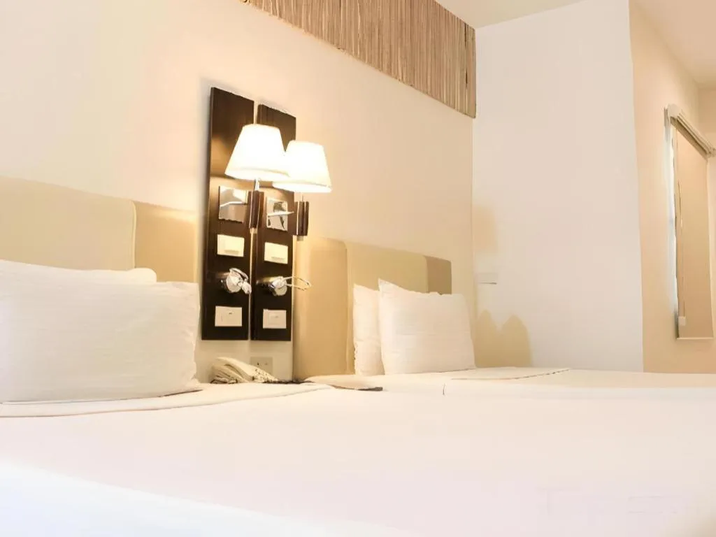 Bed in Majestic Hotel Manila - Formerly Octagon Mansion Hotel Manila