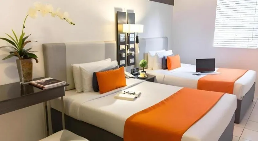 Bed in Majestic Hotel Manila - Formerly Octagon Mansion Hotel Manila