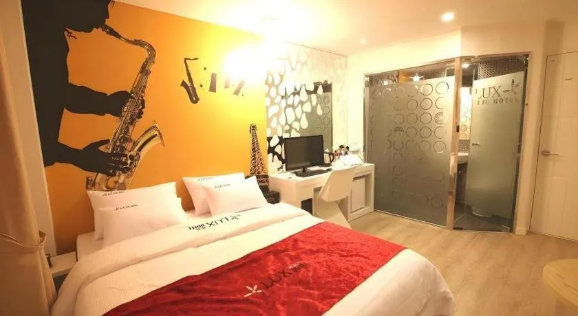 Bed in Jeju Lux Hotel