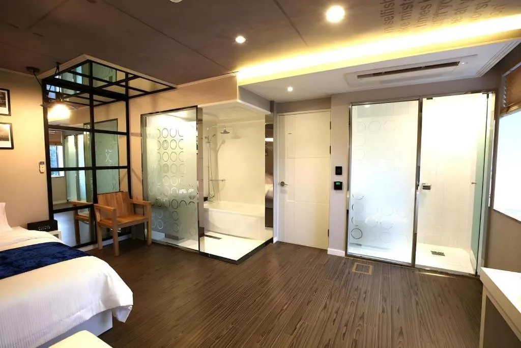 Bed in Jeju Lux Hotel