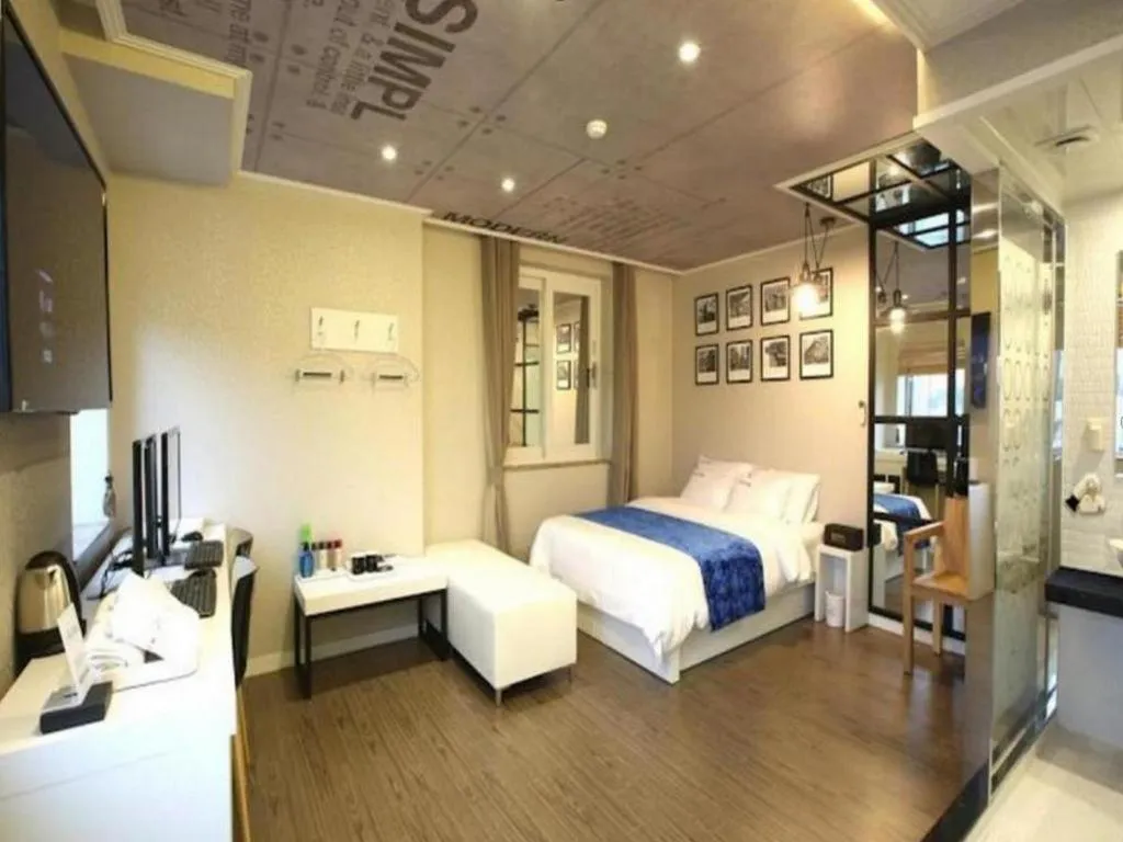 Bed in Jeju Lux Hotel