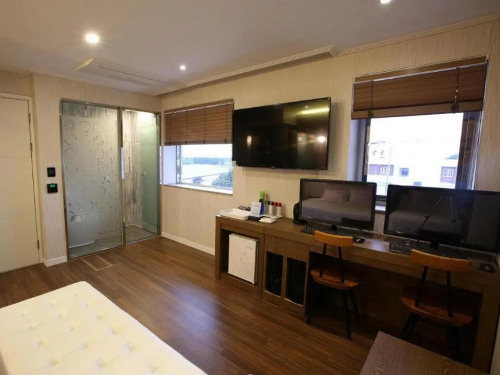 Bed in Jeju Lux Hotel