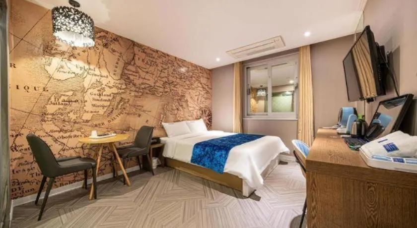 Bed in Jeju Lux Hotel