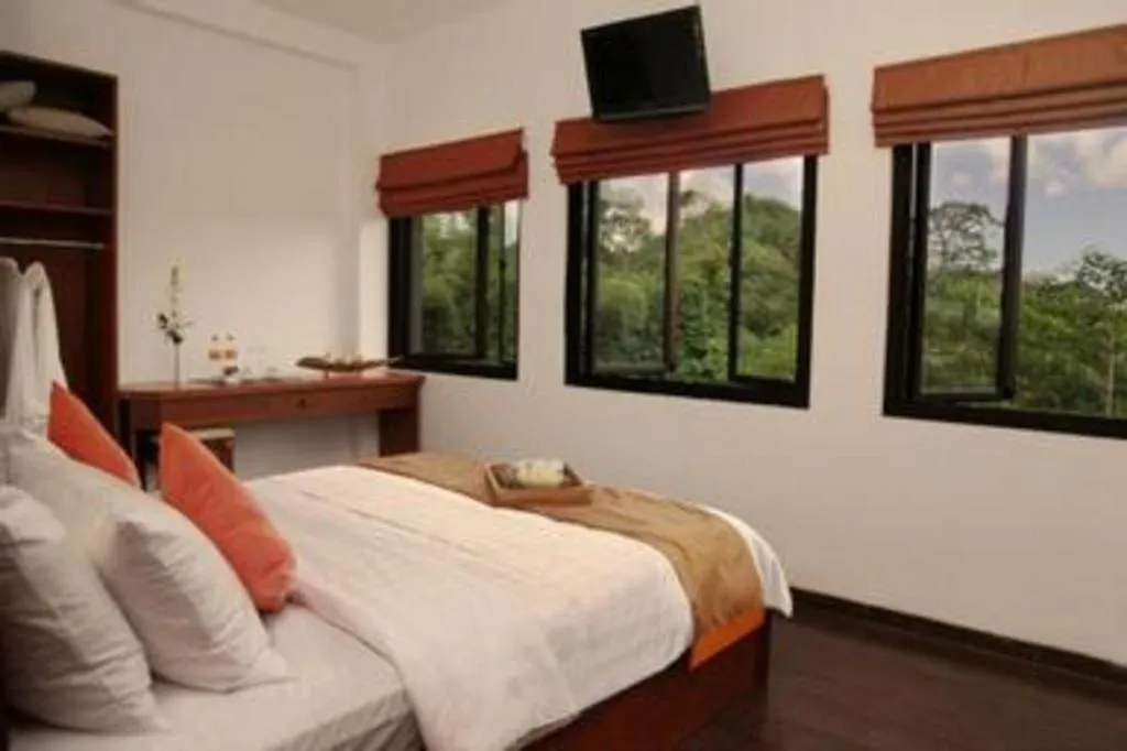 Bed in Hotel Amira Pasteur