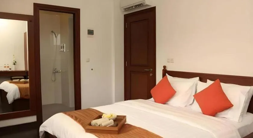 Bed in Hotel Amira Pasteur