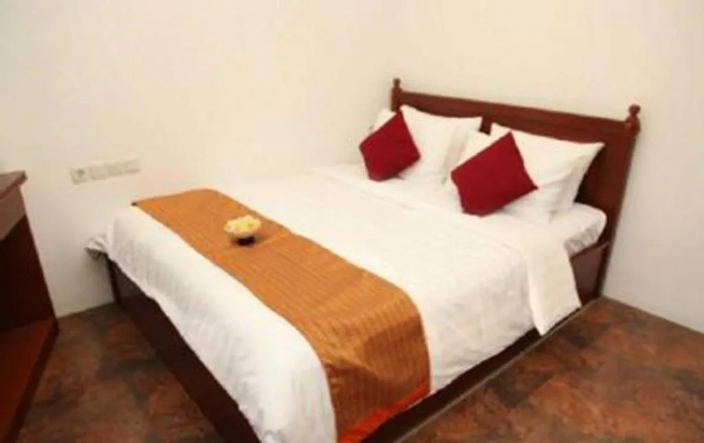 Bed in Hotel Amira Pasteur