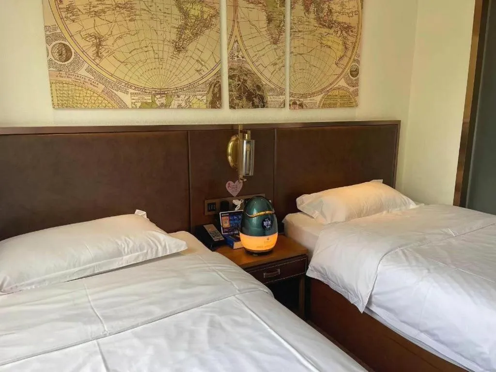 Bed in James Joyce Coffetel Xi'an Lingtong The Terracotta Army Huaqingchi University Town Metro Station