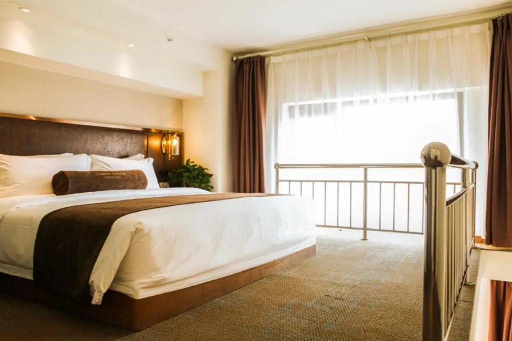 Bed in James Joyce Coffetel Xi'an Lingtong The Terracotta Army Huaqingchi University Town Metro Station