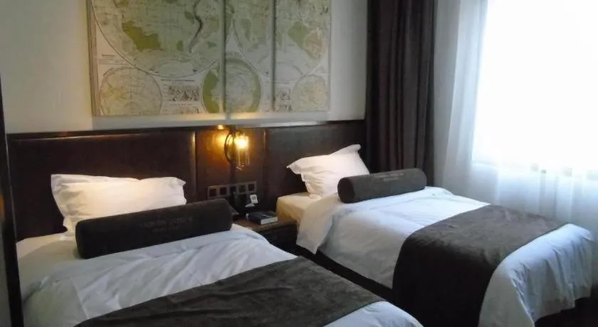 Bed in James Joyce Coffetel Xi'an Lingtong The Terracotta Army Huaqingchi University Town Metro Station