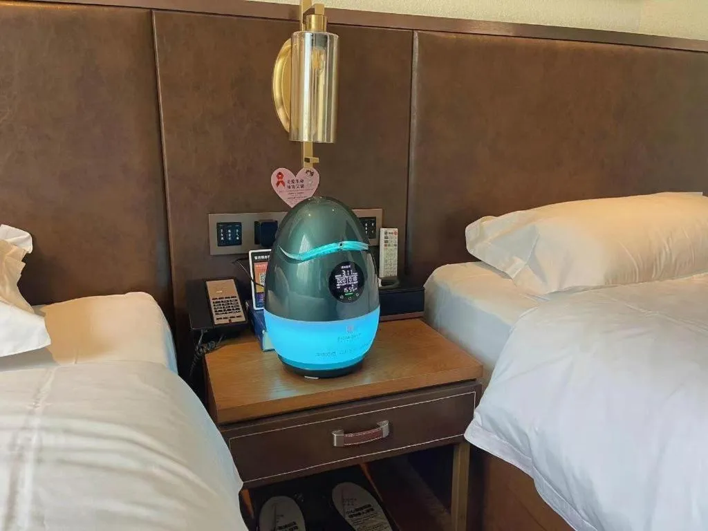 Bed in James Joyce Coffetel Xi'an Lingtong The Terracotta Army Huaqingchi University Town Metro Station