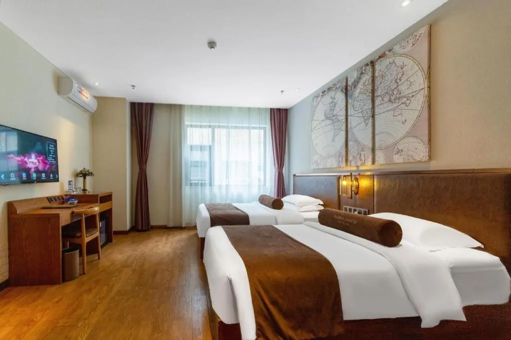 Bed in James Joyce Coffetel Xi'an Lingtong The Terracotta Army Huaqingchi University Town Metro Station