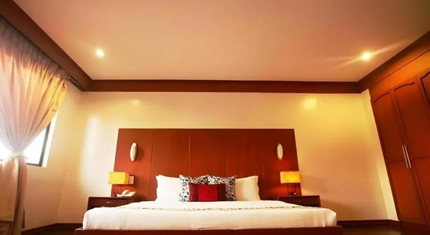 Bed in Naga Land Hotel