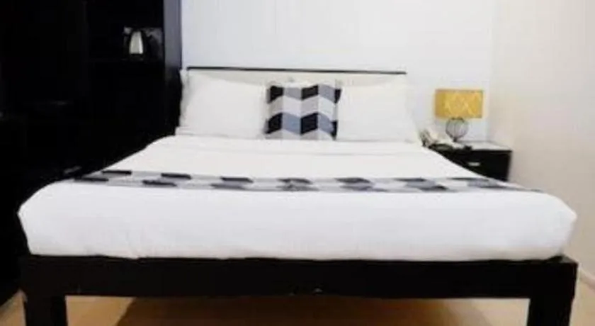 Bed in Naga Land Hotel