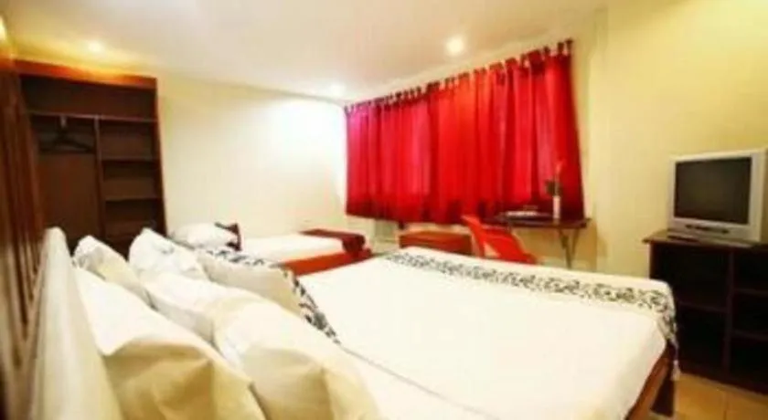 Bed in Naga Land Hotel