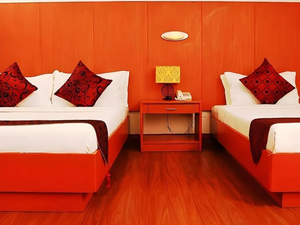 Bed in Naga Land Hotel