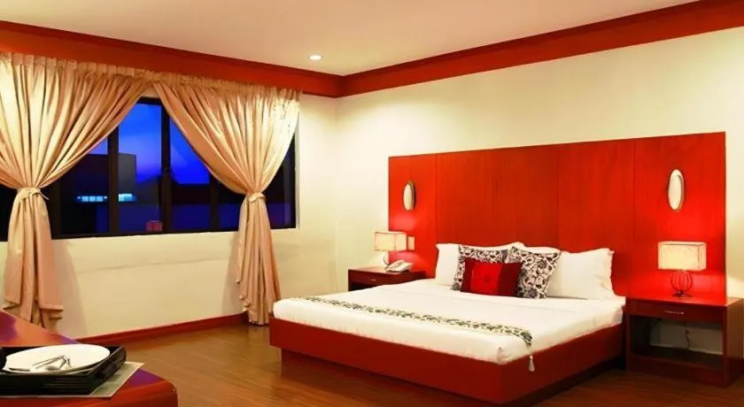 Bed in Naga Land Hotel