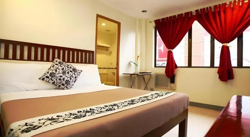 Bed in Naga Land Hotel