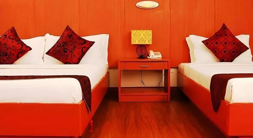 Bed in Naga Land Hotel