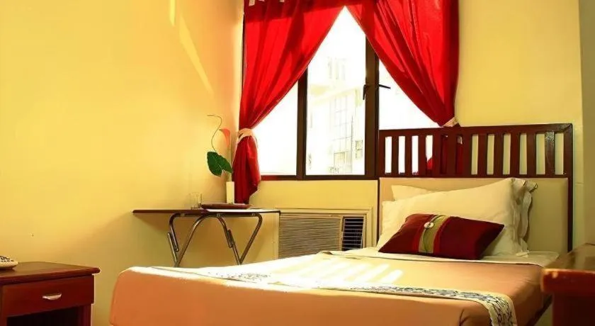 Bed in Naga Land Hotel