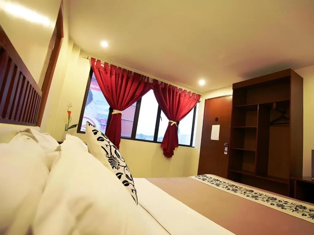 Bed in Naga Land Hotel