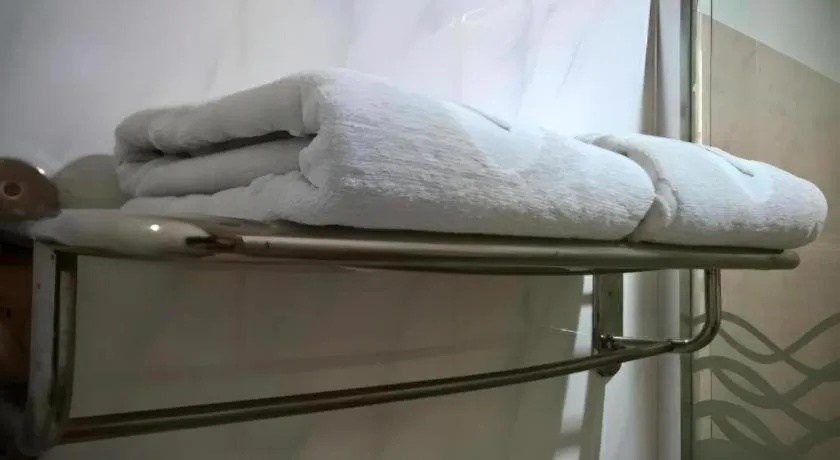 Bed in Naga Land Hotel