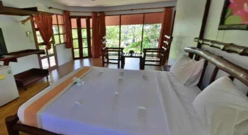 Bed in Alongkot Beach Resort Khanom Bed in Alongkot Beach Resort Khanom