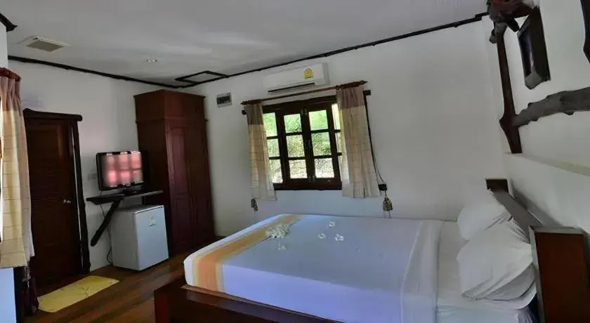 Bed in Alongkot Beach Resort Khanom Bed in Alongkot Beach Resort Khanom