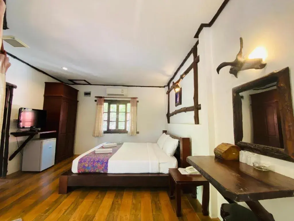 Bed in Alongkot Beach Resort Khanom Bed in Alongkot Beach Resort Khanom