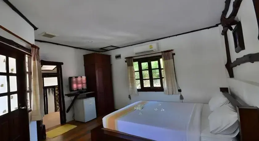 Bed in Alongkot Beach Resort Khanom Bed in Alongkot Beach Resort Khanom
