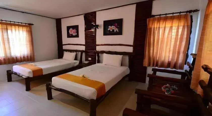Bed in Alongkot Beach Resort Khanom Bed in Alongkot Beach Resort Khanom