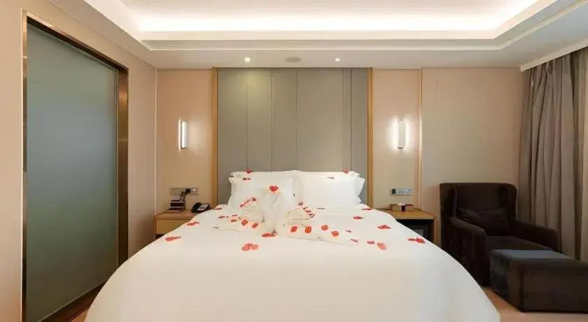 Bed in Lavande Hotels Guangzhou Fangcun Huadiwan Metro Station Bed in Lavande Hotels Guangzhou Fangcun Huadiwan Metro Station