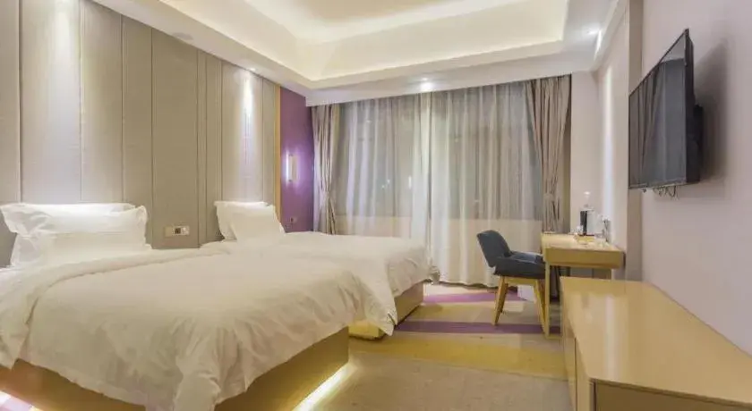 Bed in Lavande Hotels Guangzhou Fangcun Huadiwan Metro Station Bed in Lavande Hotels Guangzhou Fangcun Huadiwan Metro Station