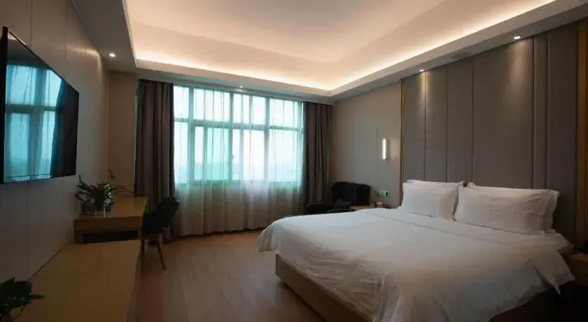 Bed in Lavande Hotels Guangzhou Fangcun Huadiwan Metro Station Bed in Lavande Hotels Guangzhou Fangcun Huadiwan Metro Station