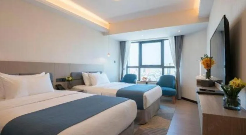 Bed in Kunming Guihua Hotel