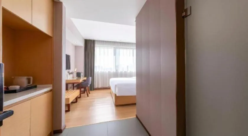 Bed in Lavande Hotel Zhongshan Dayong Rosewood Cultural Expo City