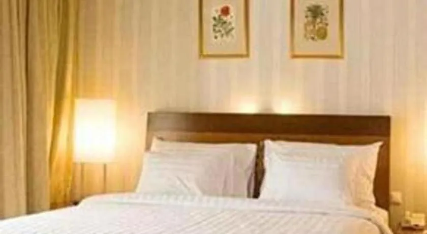 Bed in Labersa Grand Hotel &Convention Center
