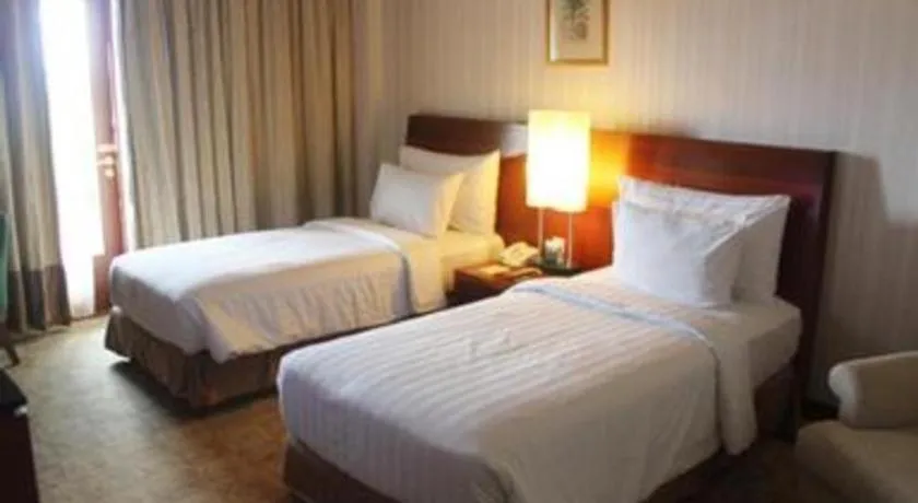 Bed in Labersa Grand Hotel &Convention Center