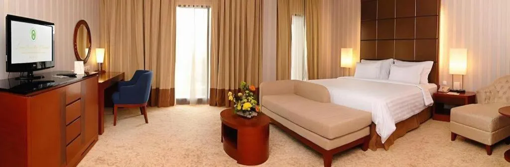 Bed in Labersa Grand Hotel &Convention Center