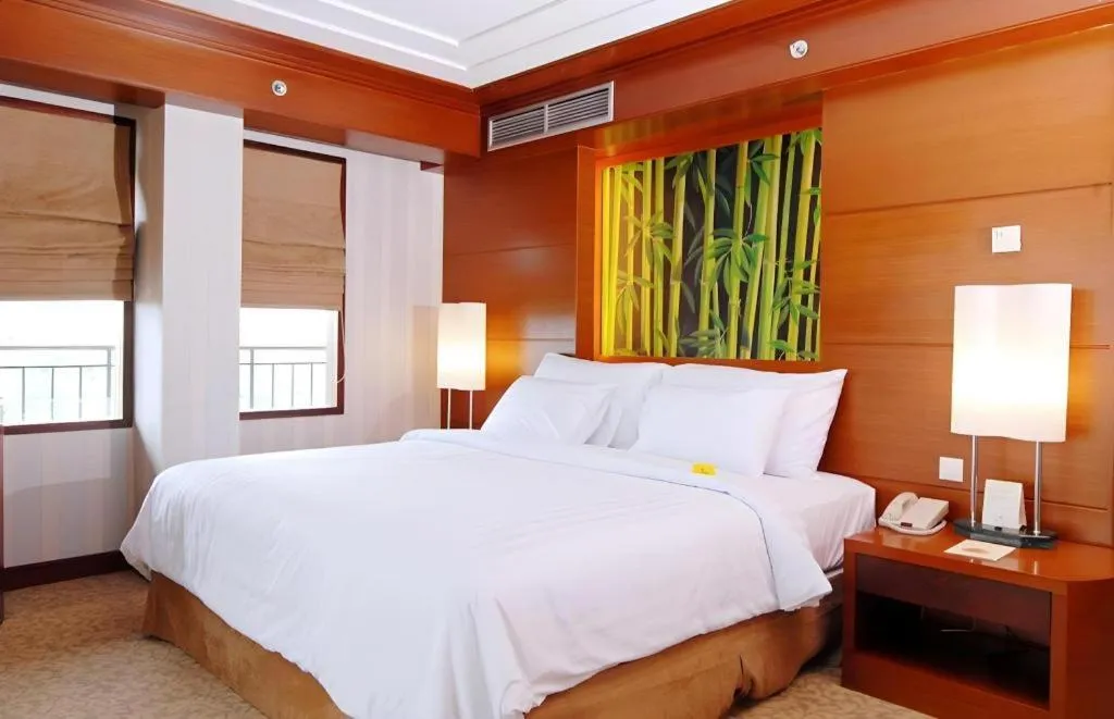 Bed in Labersa Grand Hotel &Convention Center