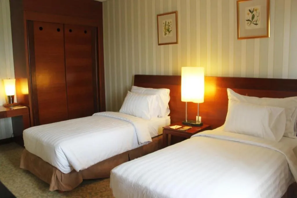 Bed in Labersa Grand Hotel &Convention Center