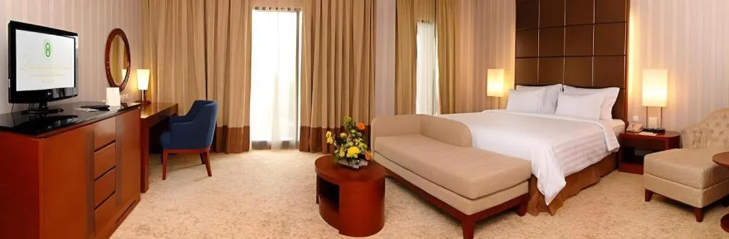 Bed in Labersa Grand Hotel &Convention Center