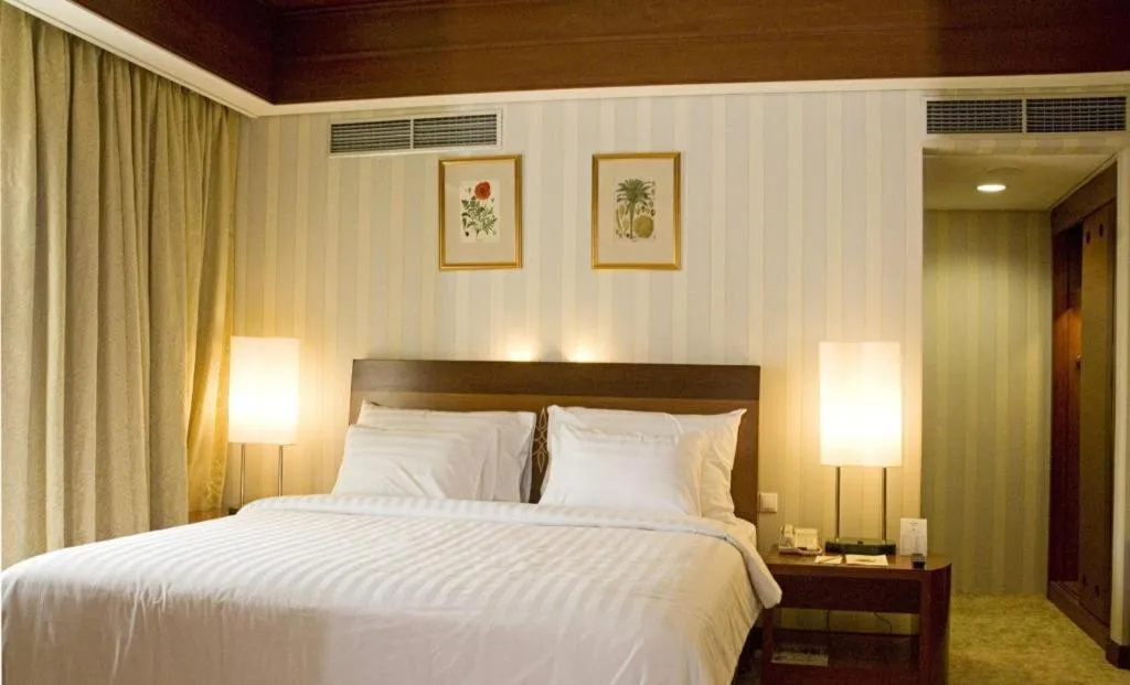 Bed in Labersa Grand Hotel &Convention Center