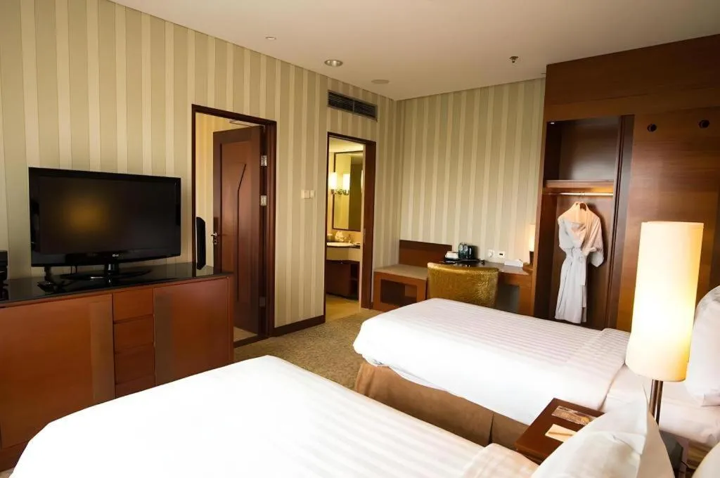 Bed in Labersa Grand Hotel &Convention Center