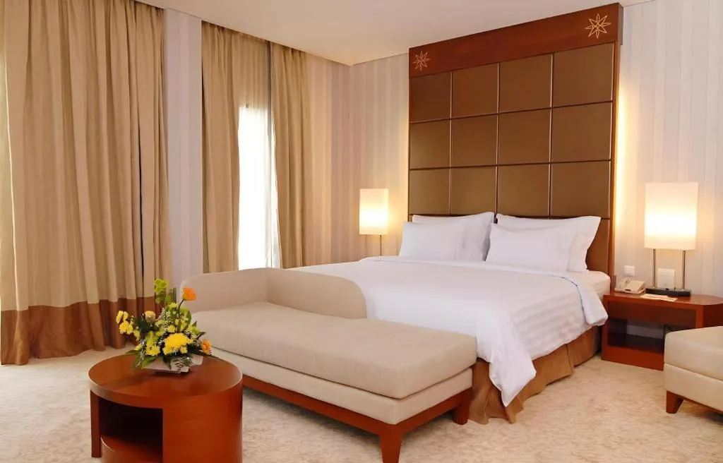 Bed in Labersa Grand Hotel &Convention Center