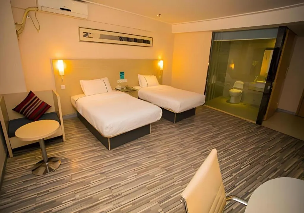 Bed in City Comfort Inn Wuhan Jiangxia