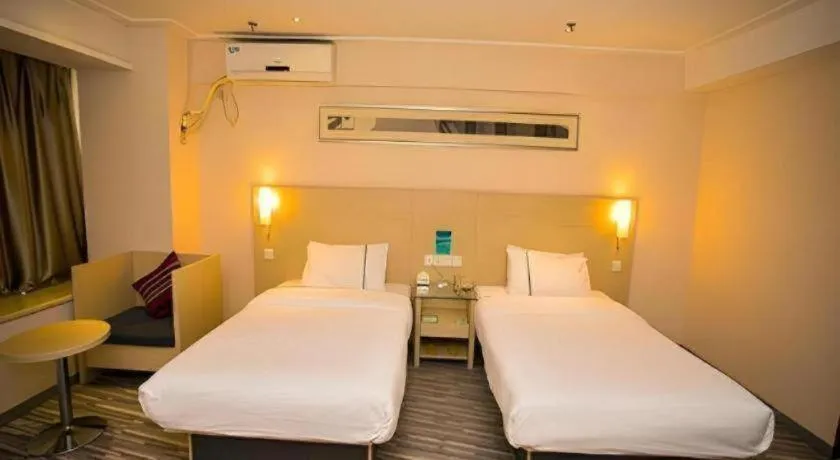 Bed in City Comfort Inn Wuhan Jiangxia