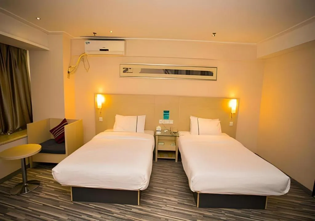 Bed in City Comfort Inn Wuhan Jiangxia
