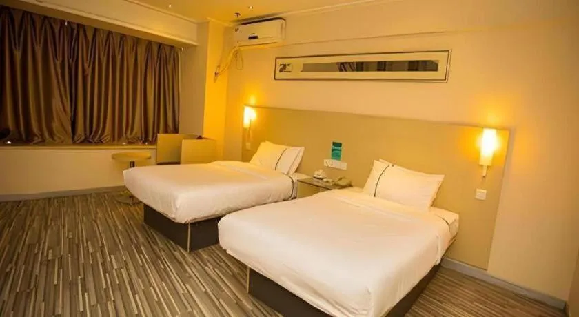 Bed in City Comfort Inn Wuhan Jiangxia