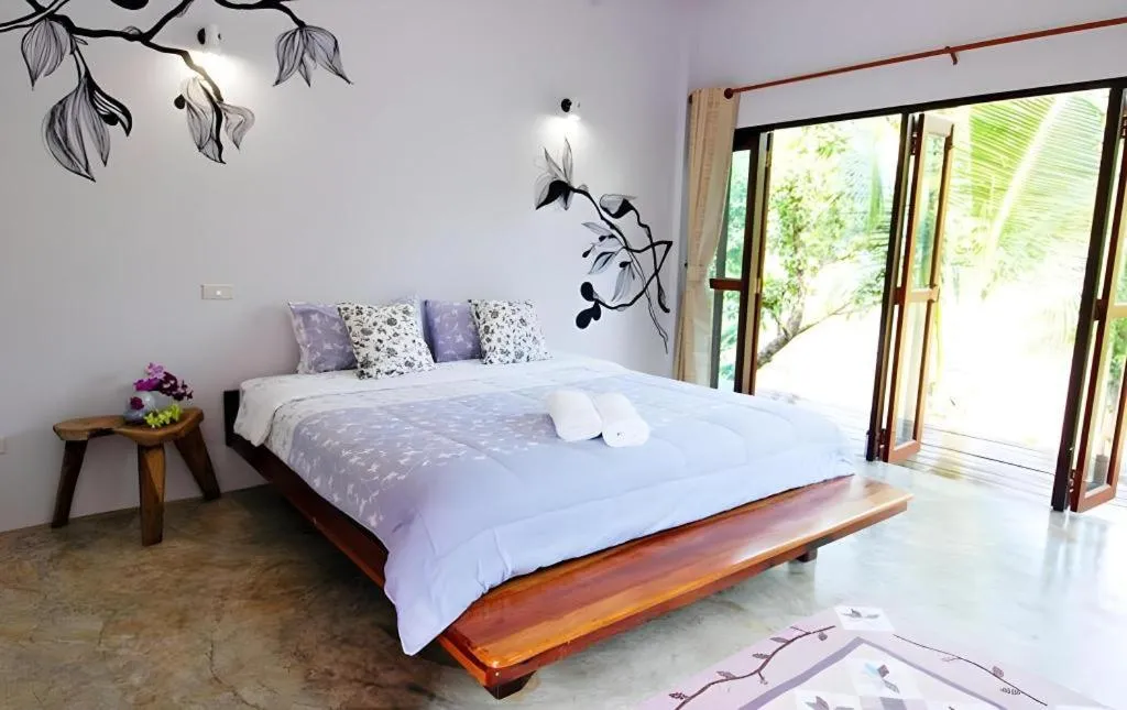 Bed in Doembang Villa