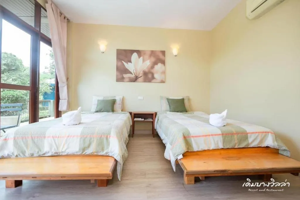 Bed in Doembang Villa